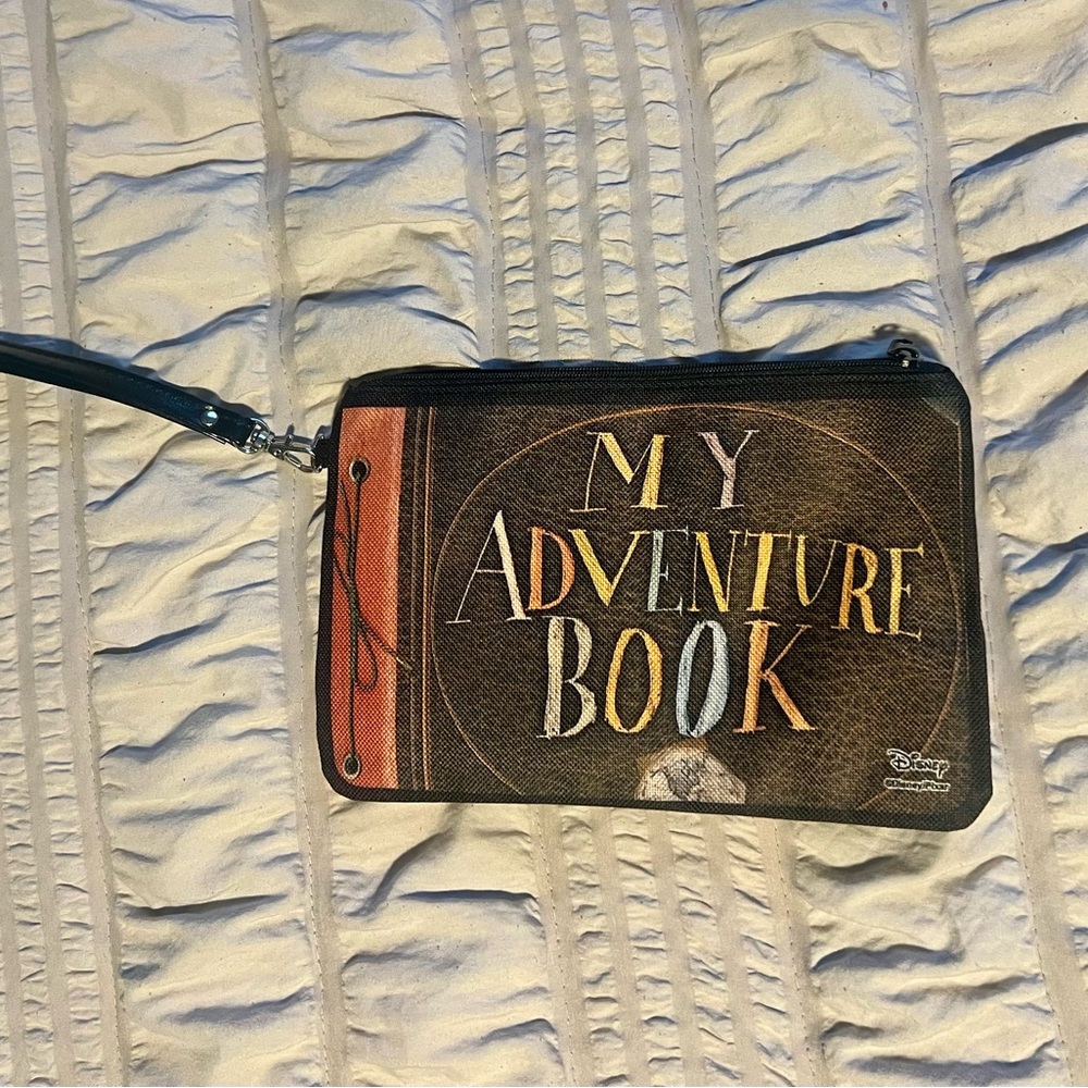 Disney Up “My Adventure Book” wristlet.